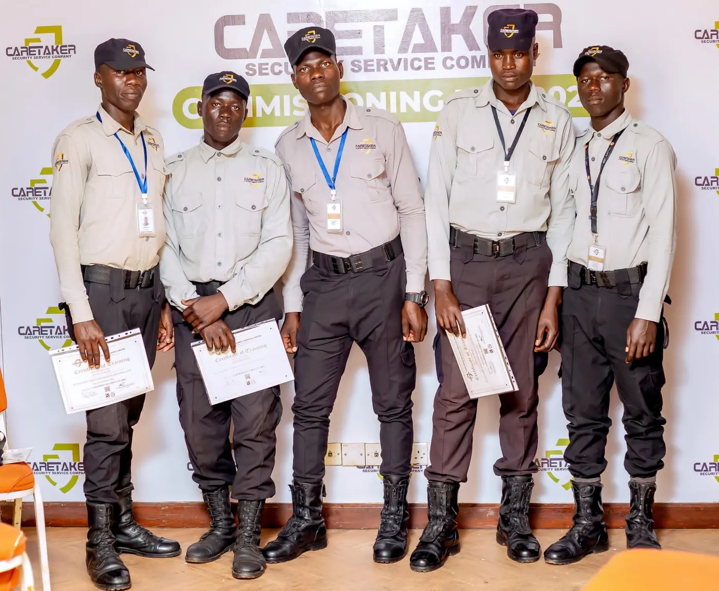 Newly commissioned Caretaker officers with certificates